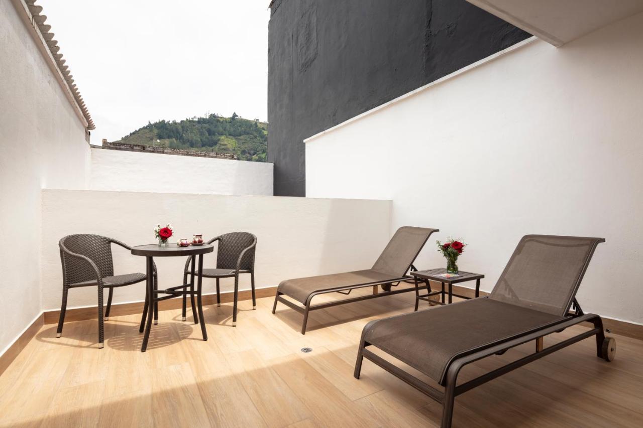 Casa Del Balcon Hotel บาญอส ภายนอก รูปภาพ