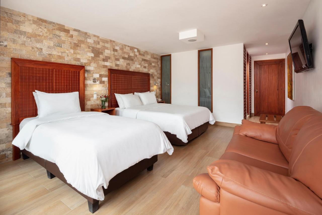 Casa Del Balcon Hotel บาญอส ภายนอก รูปภาพ